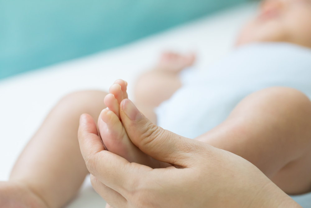 reflexotherapy-of-the-feet-of-a-newborn-baby-massage-foot-of-the-child-concept.jpg